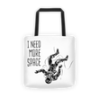 Floating spaceman Tote bag